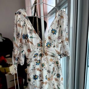 The Elyse flirty mini dress from for love and Lemons. Size xs